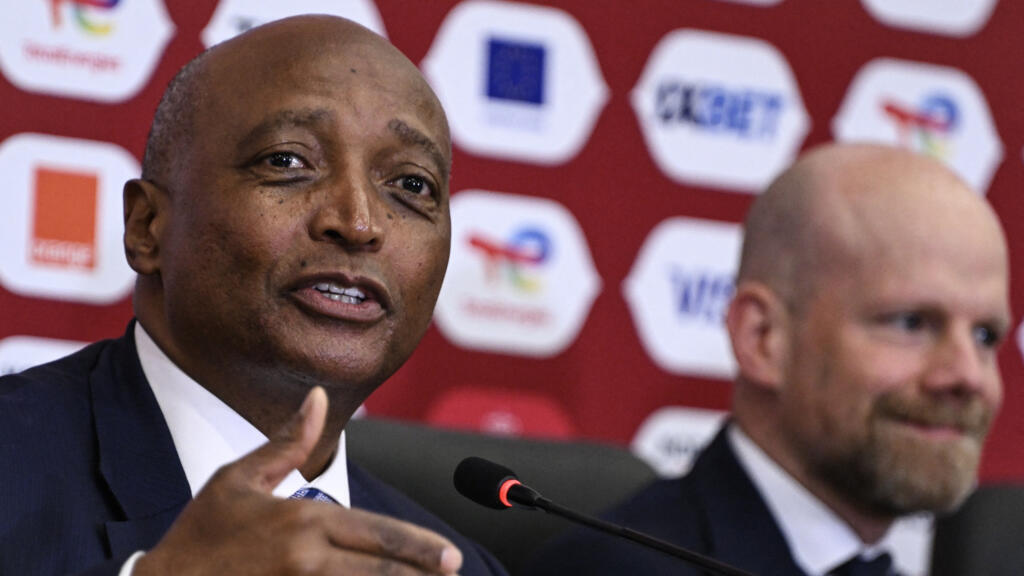Confederation of African Football President Patrice Motsepe and Brazilian Fifa Deputy Secretary general Mattias Grafstrom (R) attend a press conference at Prince Moulay Abdellah Stadium in Rabat, Moro