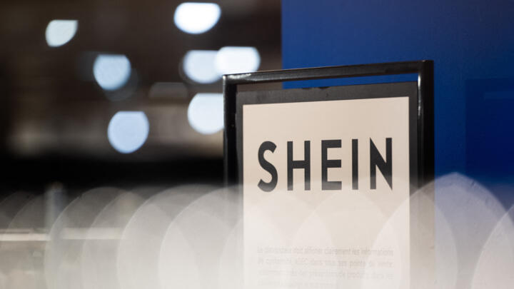 The Shein logo on display at its stall at the Bazar de l'Hotel de Ville (BHV) department store in Paris on November 4, 2025