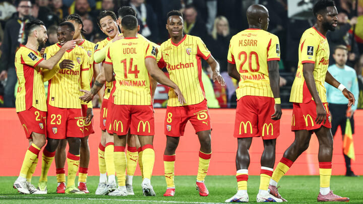 Lens' French forward #10 Florian Thauvin (4thL) celebrates with his teammates after scoring his team's first goal during the French L1 football match between RC Lens and SCO Angers at the Stade Bollaert-Delelis in Lens, northern France, on March 20, 2026.