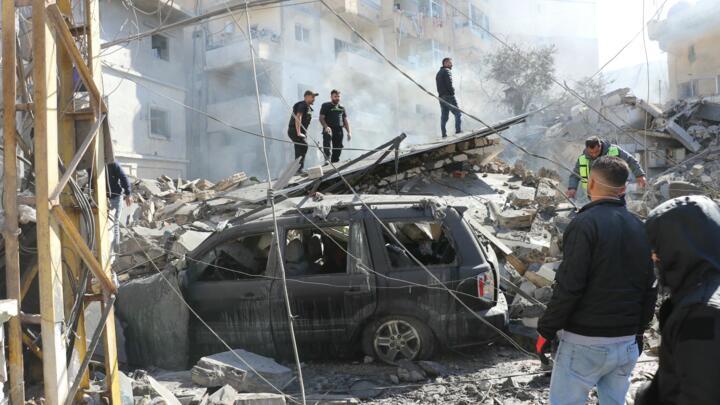 First aid responders arrive to the site of an Israeli airstrike that targeted the southern Lebanese coastal city of Tyre on March 24, 2026