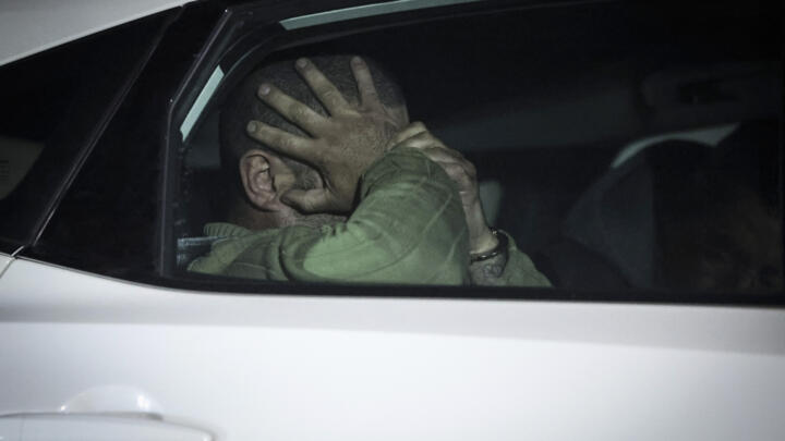 Former French police officer Cédric Prizzon, suspected of kidnapping and a double-homicide, leaves Vila Nova de Foz Coa court.
