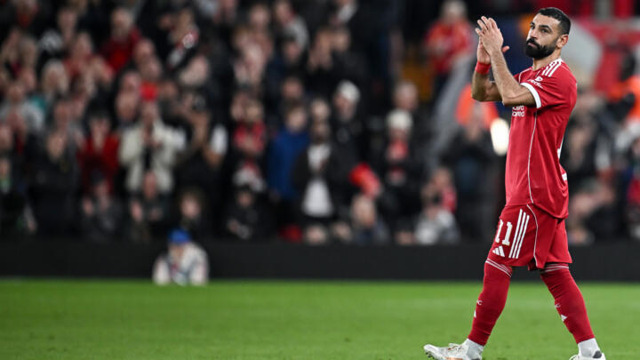 Mohamed Salah applauds as he leaves the pitch.