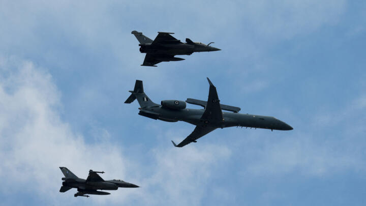 Hellenic Air Force Erieye EMB airborne, F-16 Falcon and Dassault Rafale fighting jets fly during a military parade marking Greece's Independence Day, in Athens, Greece, March 25, 2026