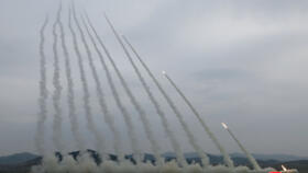 A training exercise of North Korean Army's 600mm-calibre ultra-precision multiple rocket launchers, at an undisclosed location in North Korea