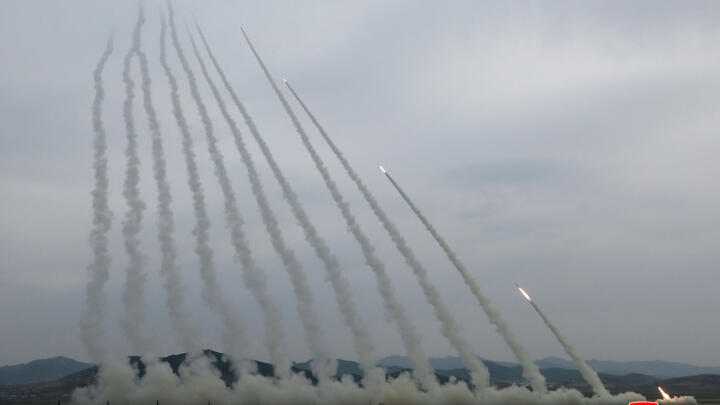 A training exercise of North Korean Army's 600mm-calibre ultra-precision multiple rocket launchers, at an undisclosed location in North Korea