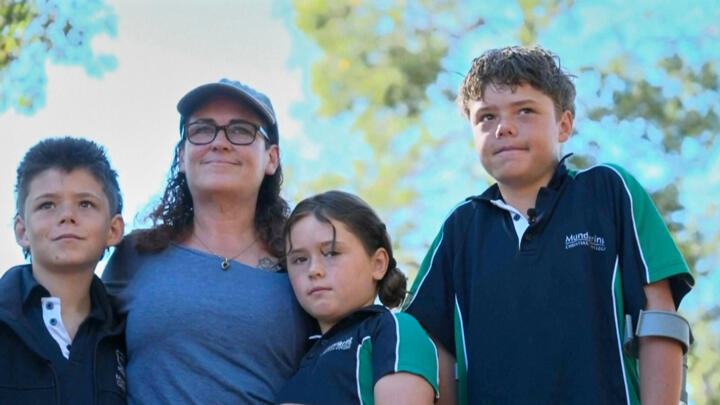 Austin Appelbee, right, poses with his family in Quindalup, Western Australia on February 3, 2026.