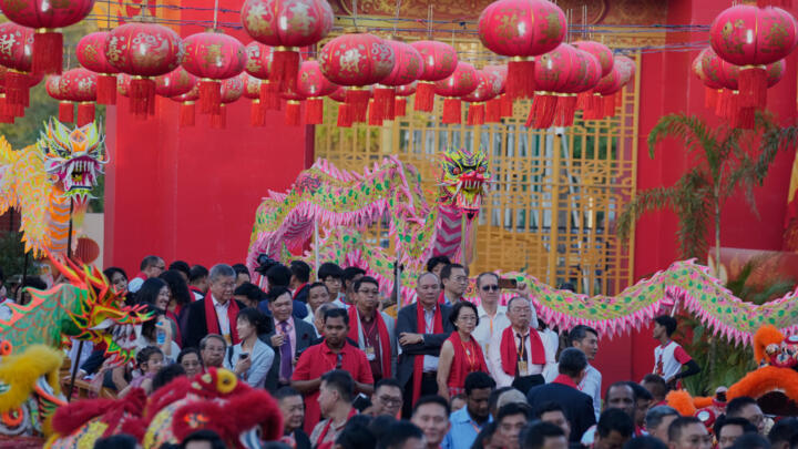 Local Chinese attend a celebration of the Lunar New Year of the Horse at Thuwunna stadium February 14, 2026, in Yangon, Myanmar