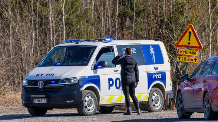 A Police car blocks the Savistontie road after two unidentified drones entered and landed in Finnish territory, in Kouvola, Finland, Sunday, March 29, 2026