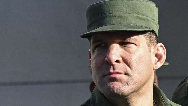Cuba's Colonel Raul Guillermo Rodriguez Castro, grandson of former leader Raul Castro, attends the funeral of the 32 Cuban soldiers killed during the US incursion in Venezuela at Colon cemetery in Hav